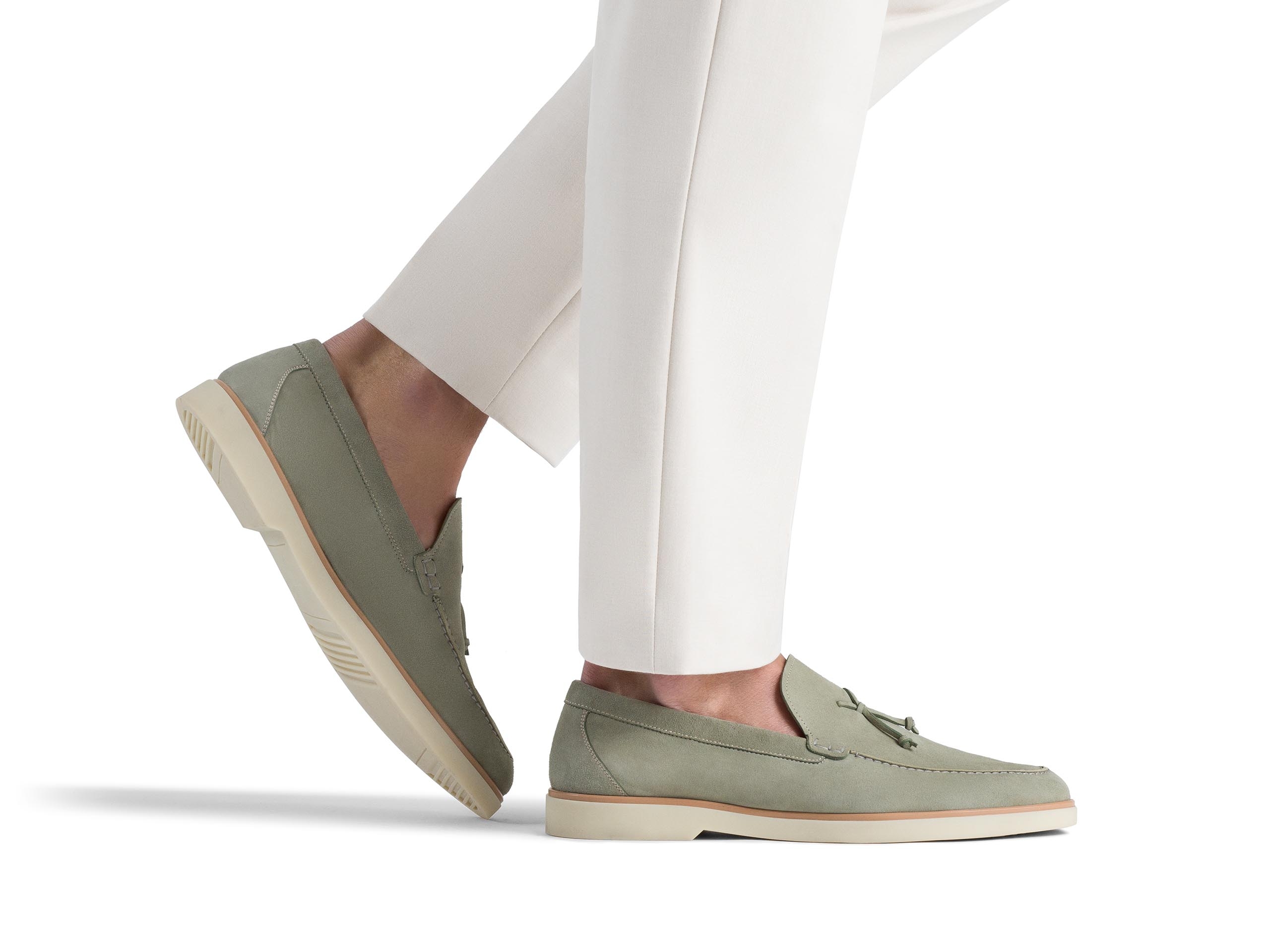 The Beignet Tassel Olive Green Suede pairs well with light color pants